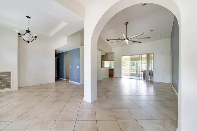 a view of an entryway with a chandelier