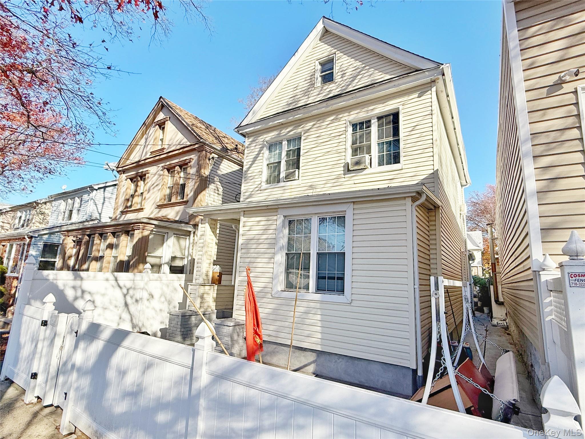 110-39 156th Street Queens, NY 11433 - Photo 25 of 27 a view of a house with a yard