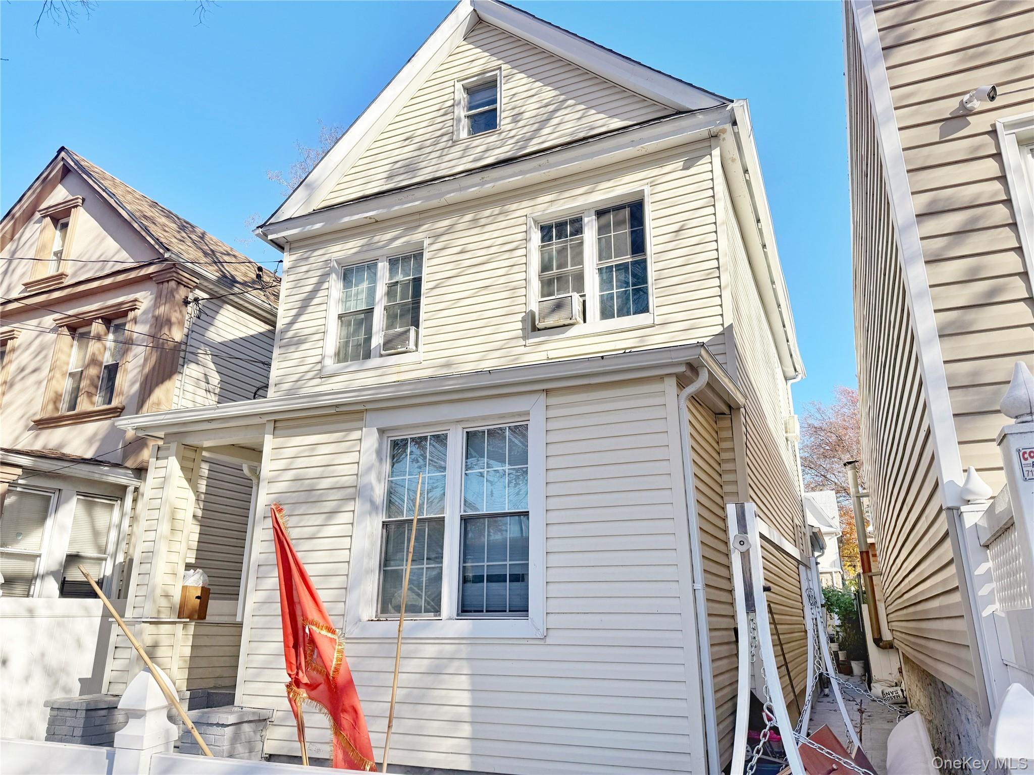 110-39 156th Street Queens, NY 11433 - Photo 26 of 27 a view of a house with a small space