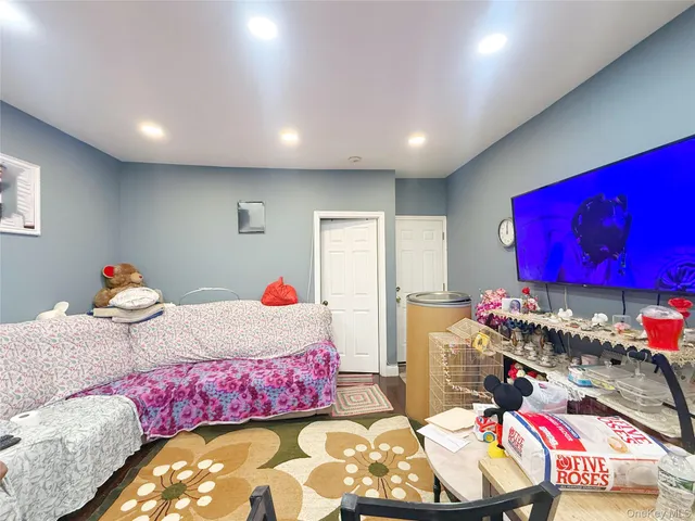 a kitchen with a stove a sink and a microwave