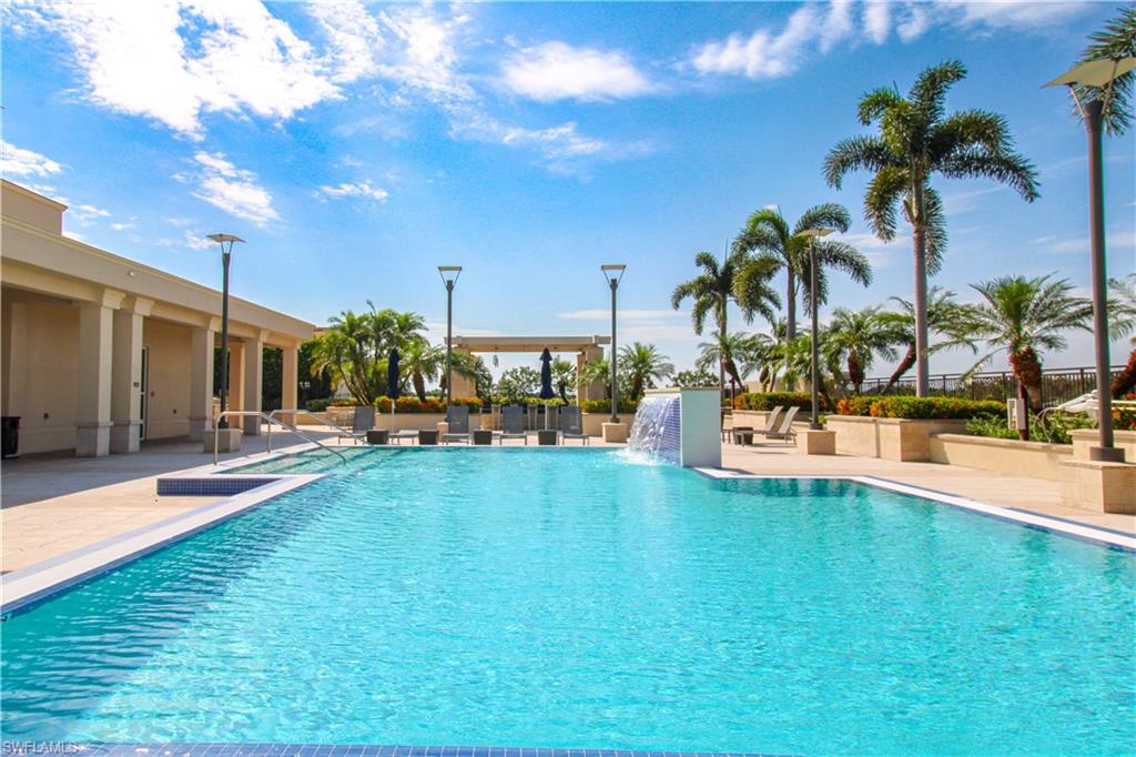 9123 Strada Place, Unit 7410 Naples, FL 34108 - Photo 8 of 50 View of pool featuring a patio area and pool water feature