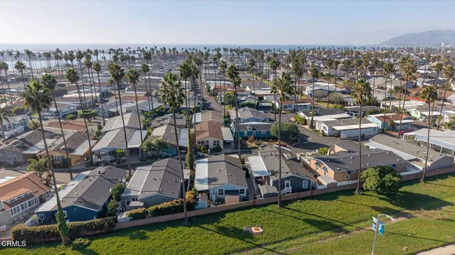 a view of a water fountain in front of the house