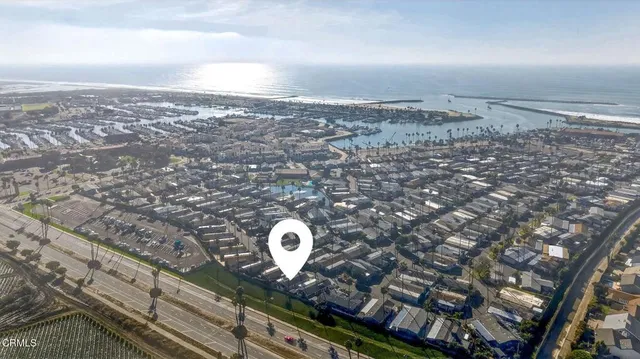 a large building with a ocean view