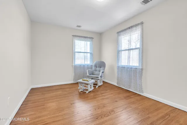 a workspace with wooden floor