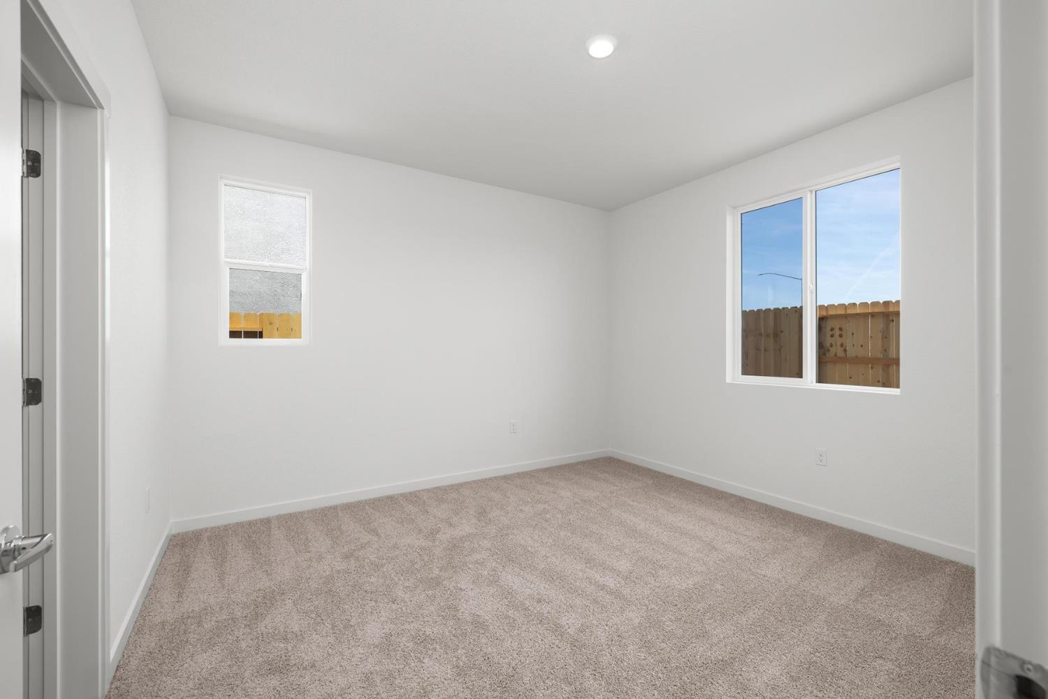 809 Chatham Lane Patterson, CA 95363 - Photo 9 of 16 an empty room with a window