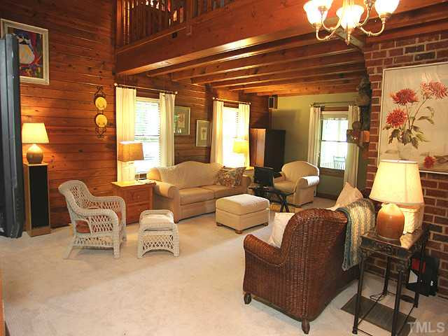 1314 Bill Poole Road Rougemont, NC 27572 - Photo 3 of 22 a living room with furniture and a large window