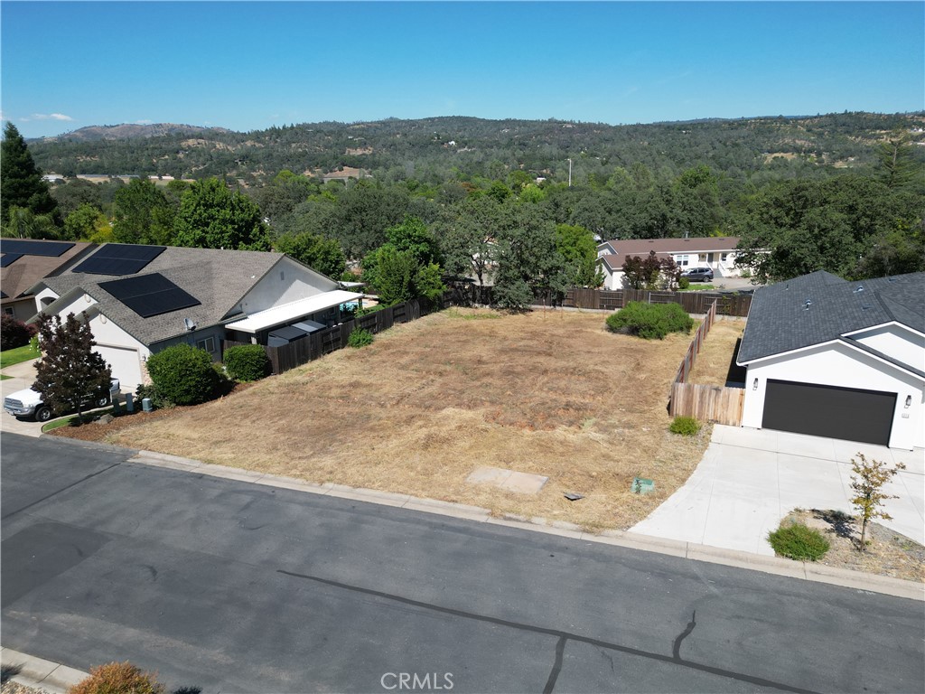 205 Lariat Loop Oroville, CA 95966 - Photo 6 of 8 an aerial view of a house with a garden