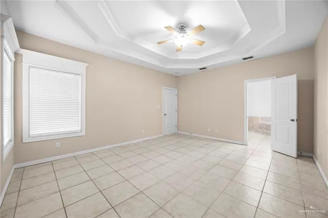 an empty room with fan