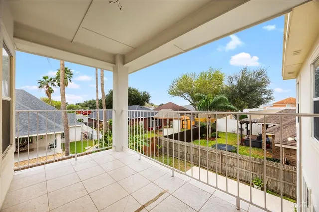 a view of a balcony with furniture