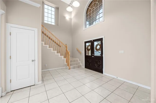 a view of an entryway with wooden floor