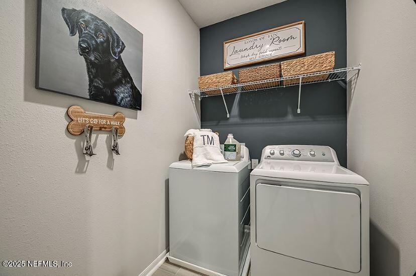 299 Cherry Elm Drive St. Augustine, FL 32092 - Photo 15 of 18 a utility room with dryer and washer