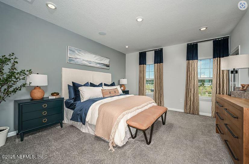 299 Cherry Elm Drive St. Augustine, FL 32092 - Photo 7 of 18 a spacious bedroom with a bed and a dresser