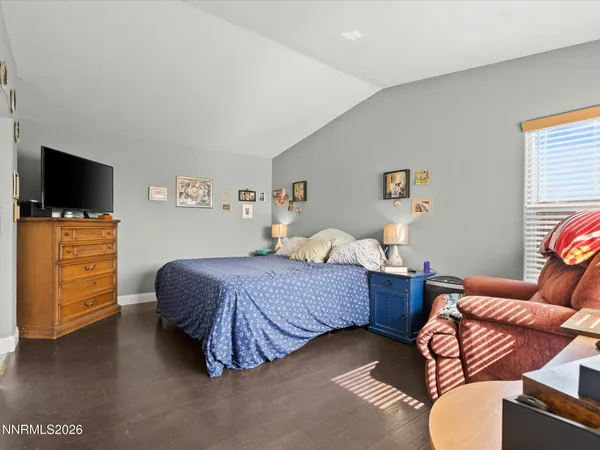 a bedroom with a bed and furniture