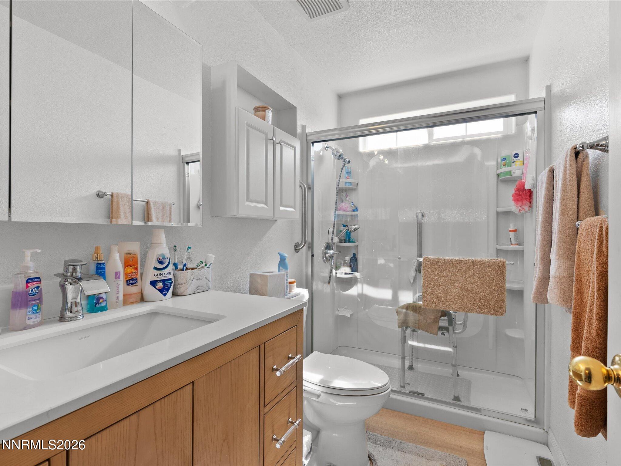 710 Keppel Street Fallon, NV 89406 - Photo 29 of 38 a bathroom with a sink toilet and shower