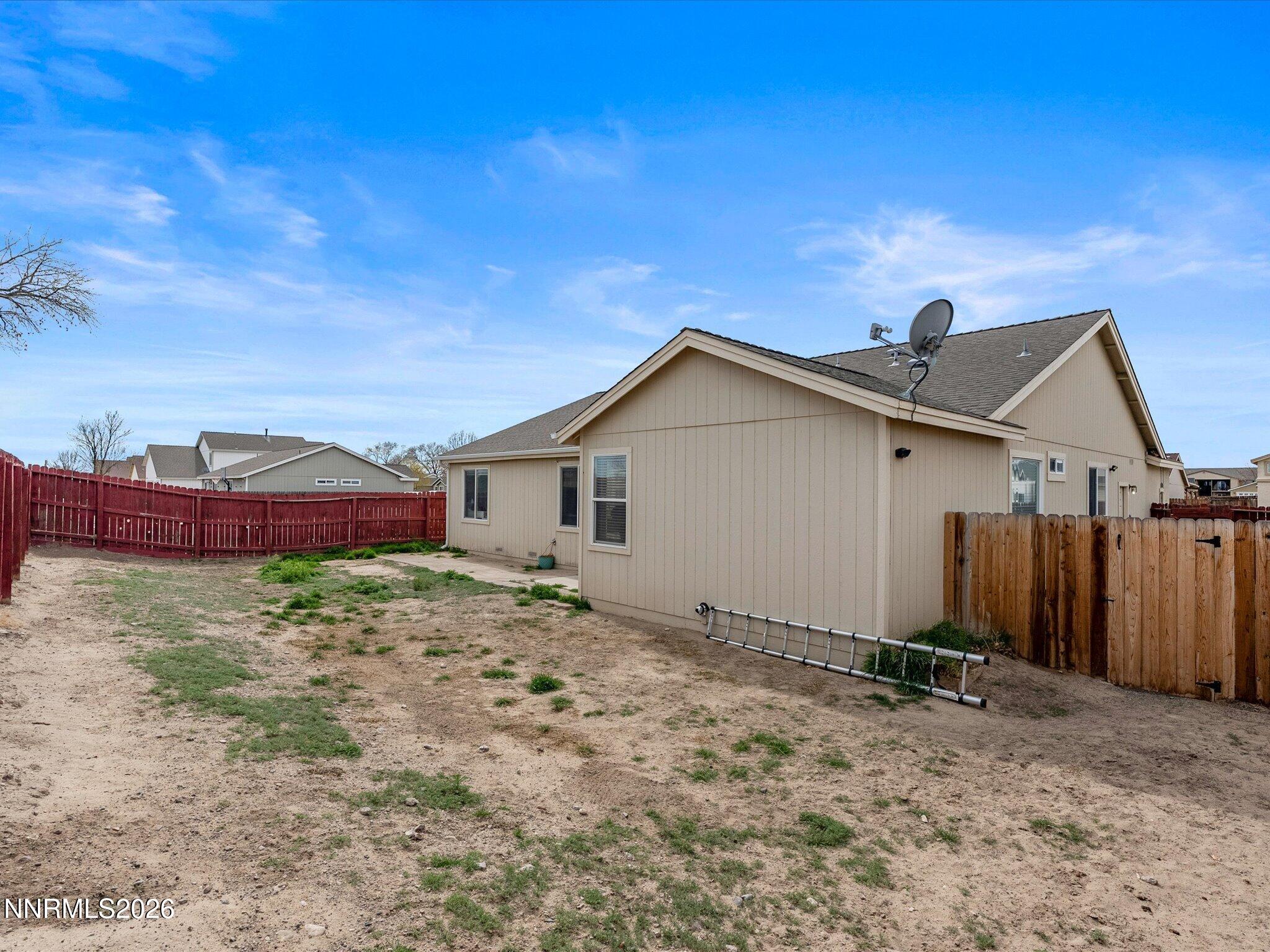 710 Keppel Street Fallon, NV 89406 - Photo 34 of 38 a view of a house with a yard