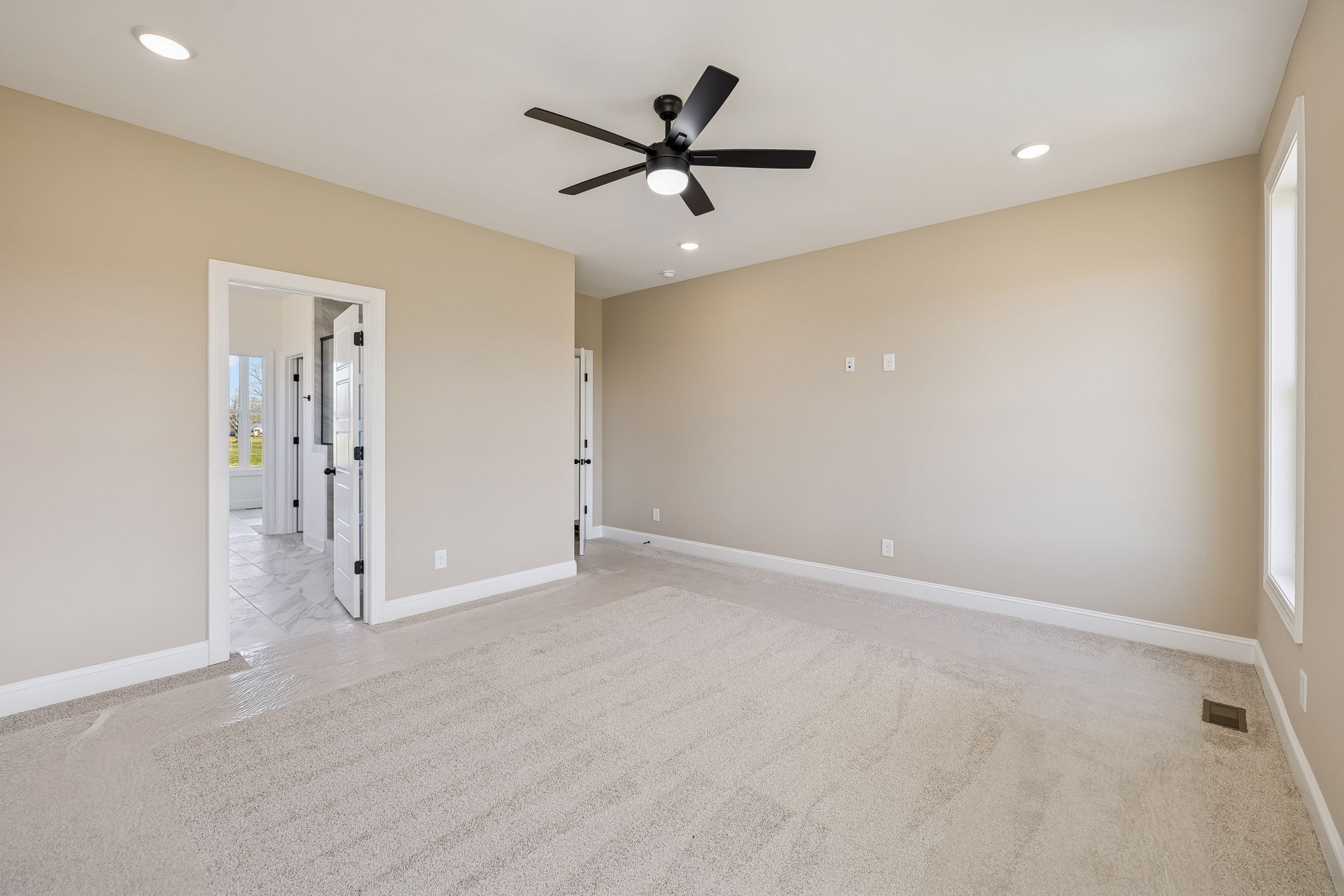 4741 Short Mountain Road Woodbury, TN 37190 - Photo 21 of 56 an empty room with closet and a ceiling fan