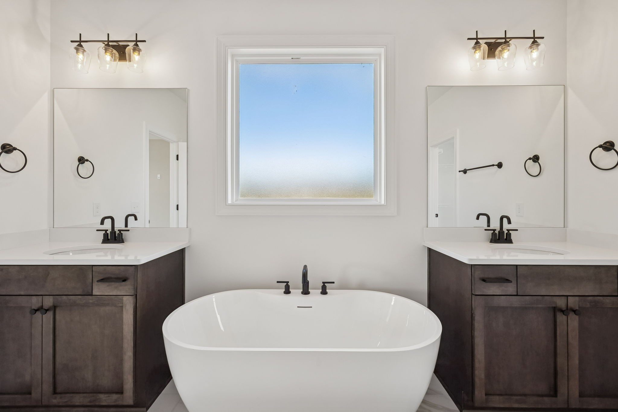 4741 Short Mountain Road Woodbury, TN 37190 - Photo 23 of 56 a white bath tub sitting next to a bathroom sink