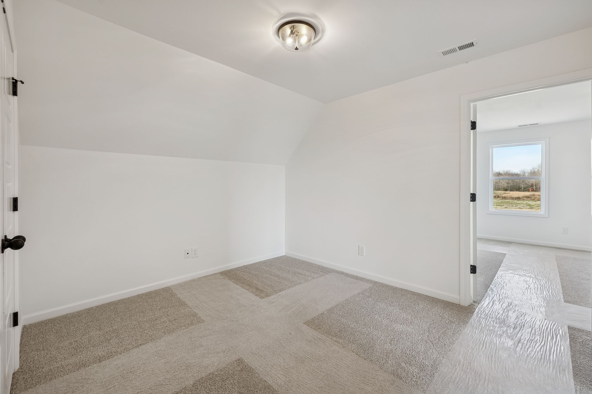 4741 Short Mountain Road Woodbury, TN 37190 - Photo 42 of 56 an empty room with windows