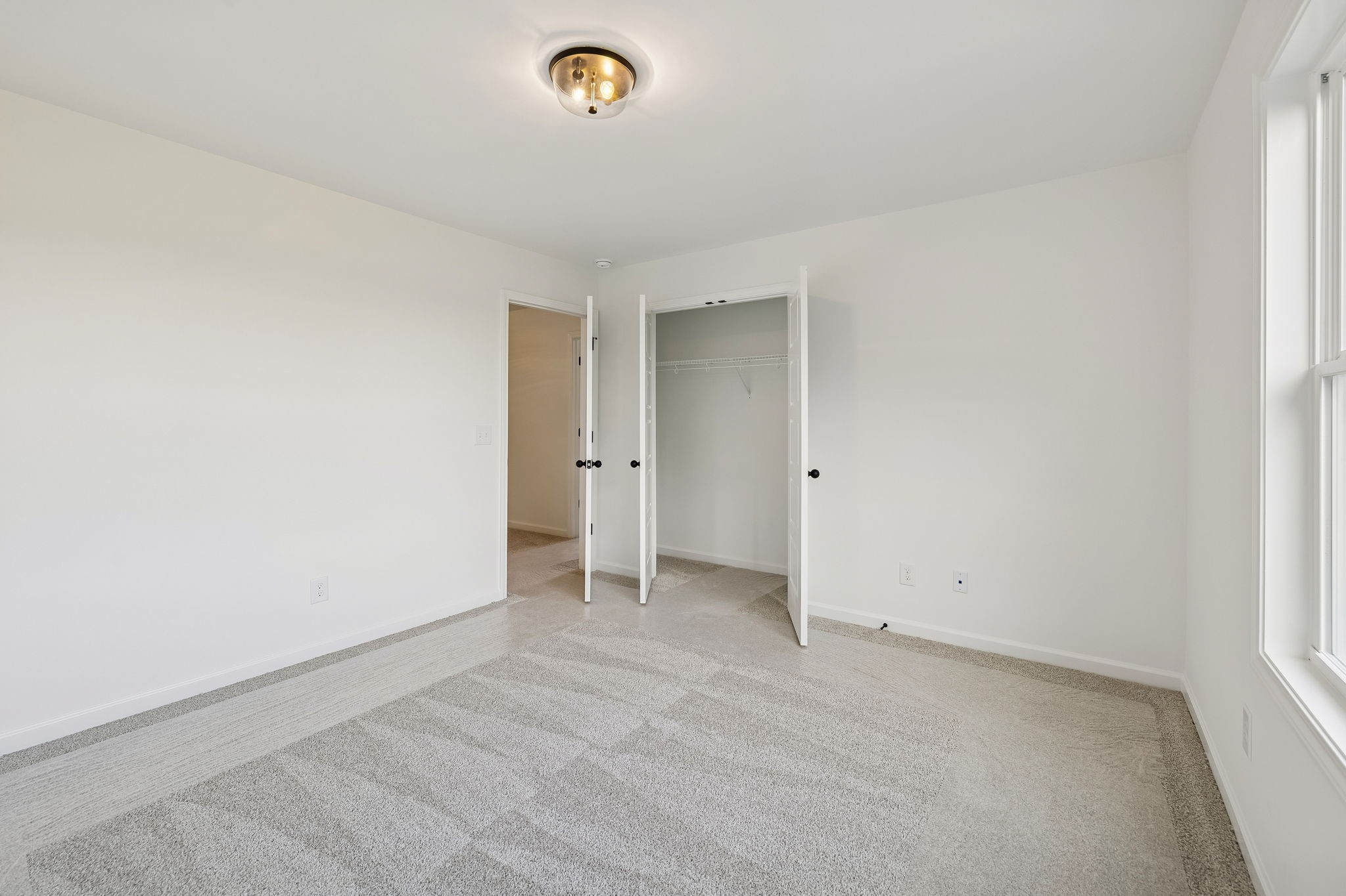4741 Short Mountain Road Woodbury, TN 37190 - Photo 45 of 56 an empty room with a natural light