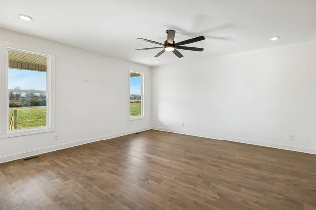 a kitchen with a sink a counter space cabinets and stainless steel appliances