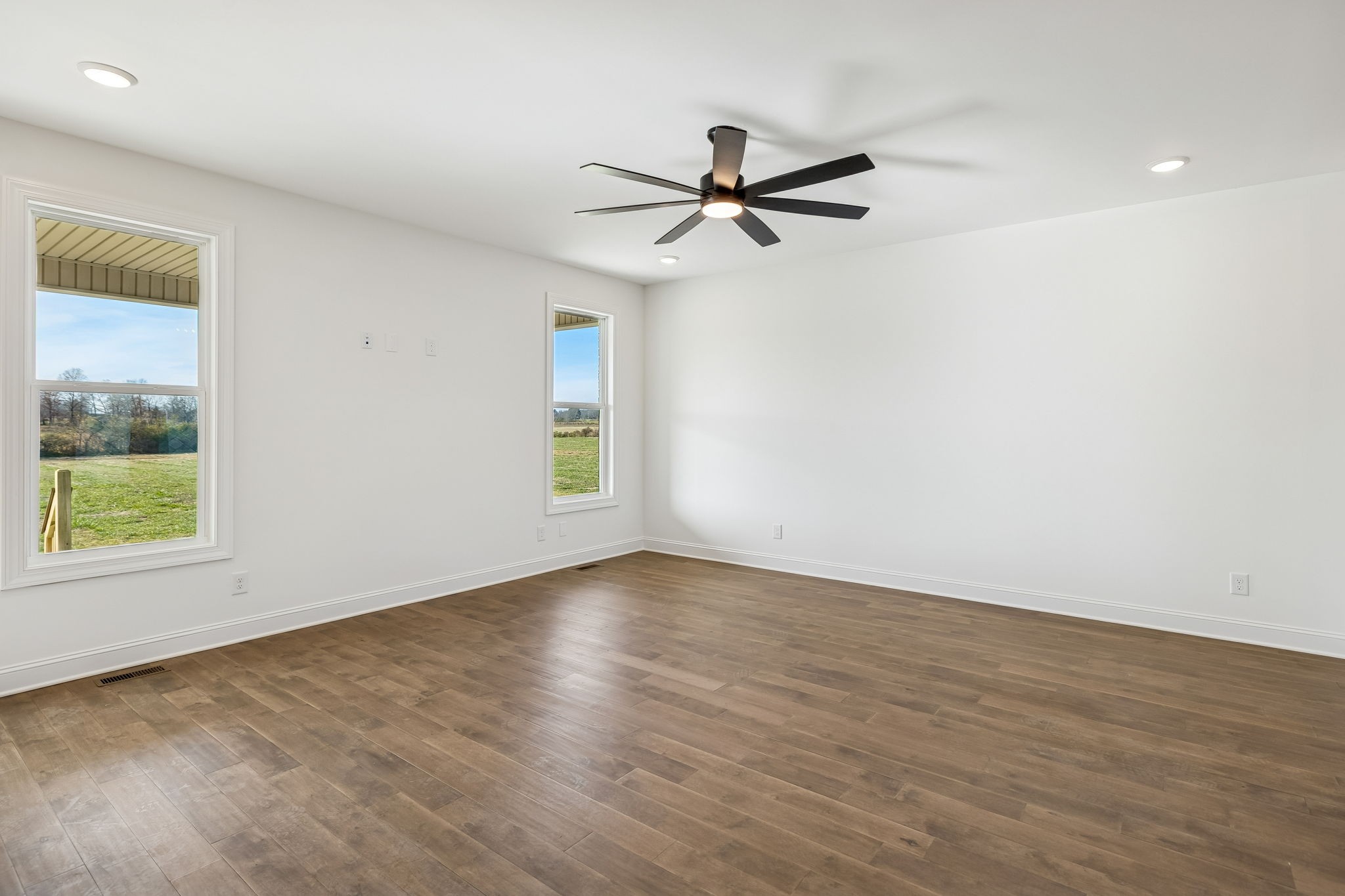 4741 Short Mountain Road Woodbury, TN 37190 - Photo 10 of 56 wooden floor in an empty room with a window
