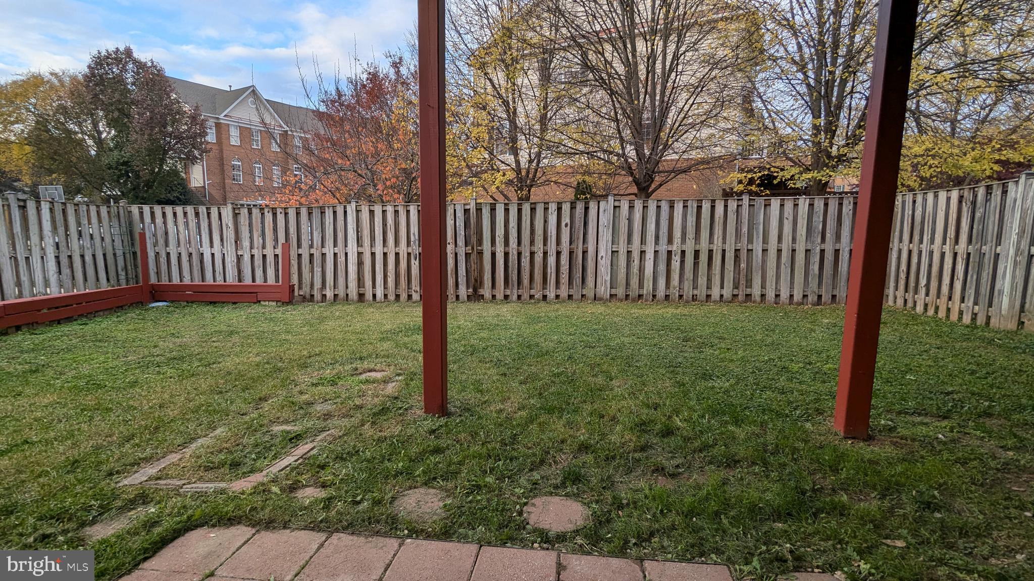 21506 Trowbridge Square Ashburn, VA 20147 - Photo 57 of 66 a view of a yard with flower plants