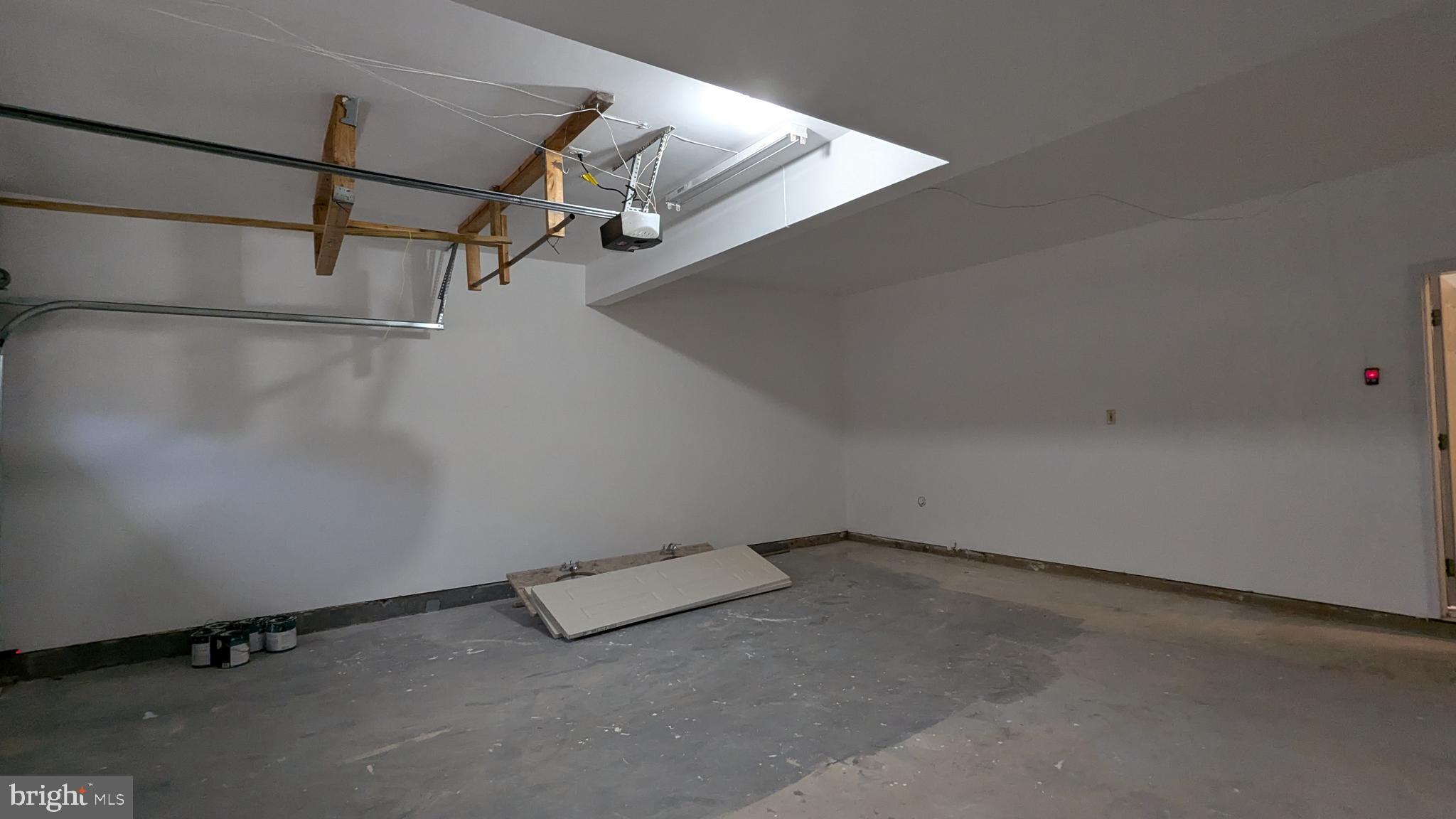 21506 Trowbridge Square Ashburn, VA 20147 - Photo 62 of 66 a view of a room with racks on the wall