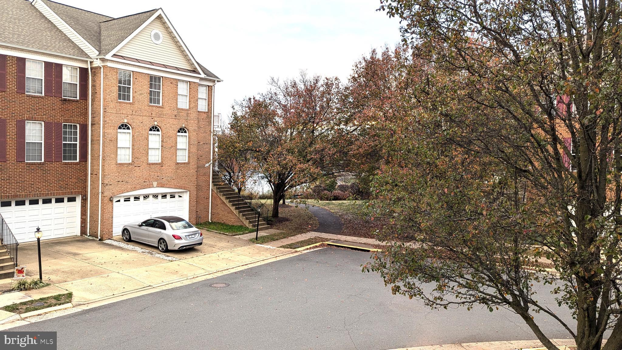 21506 Trowbridge Square Ashburn, VA 20147 - Photo 63 of 66 a house view with a outdoor space
