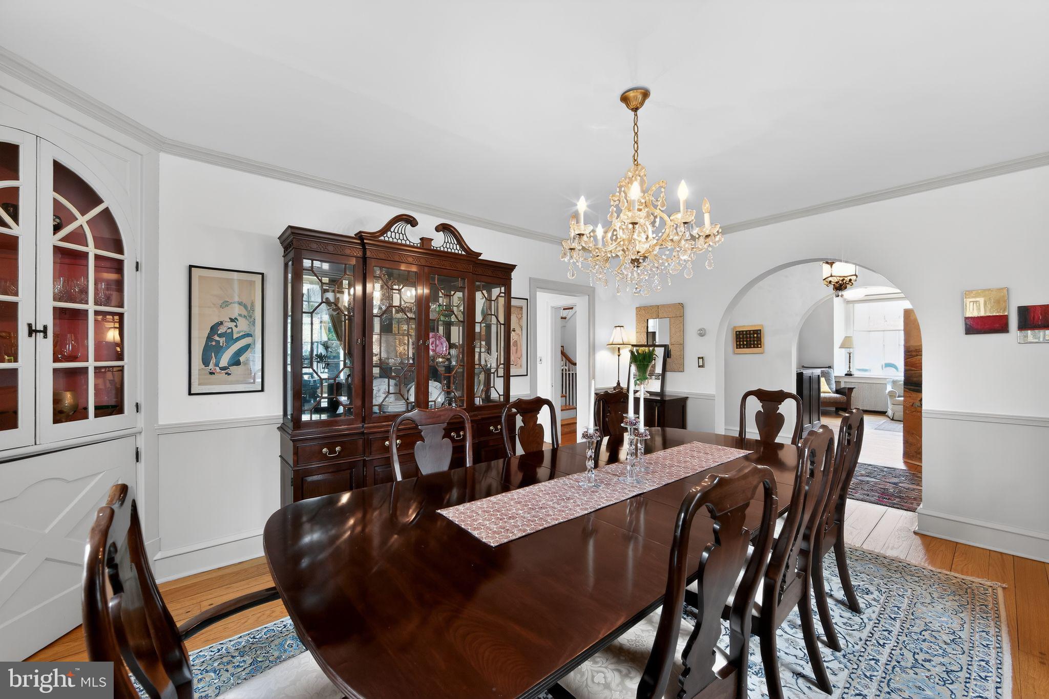 306 Windsor Avenue Wayne, PA 19087 - Photo 17 of 36 a view of a dining room with furniture and chandelier