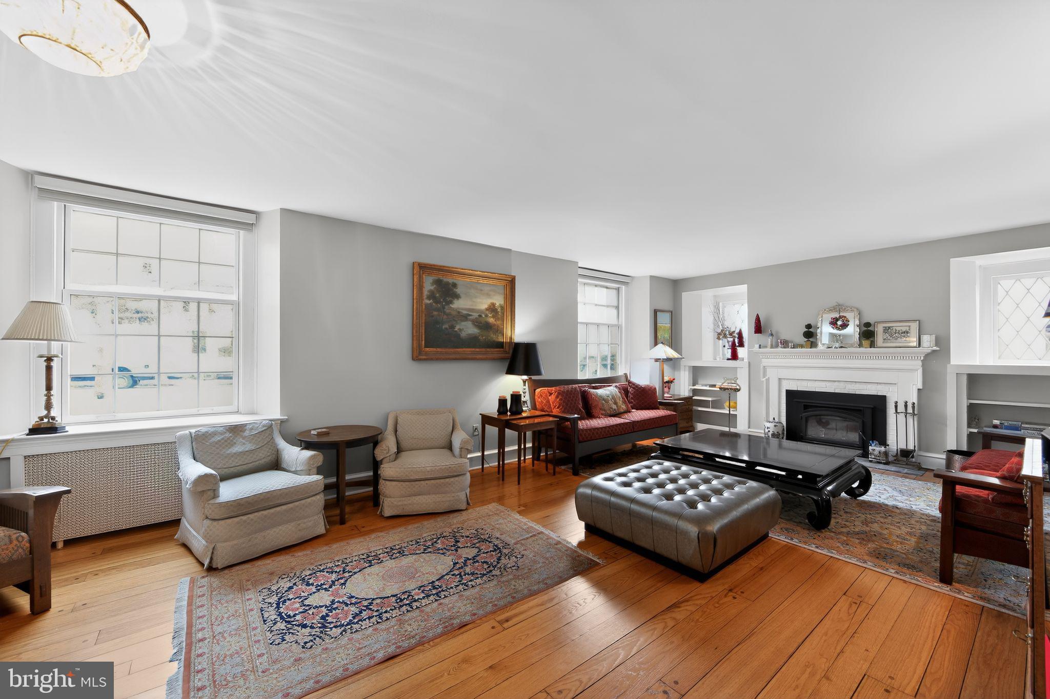306 Windsor Avenue Wayne, PA 19087 - Photo 18 of 36 a living room with furniture and a fireplace