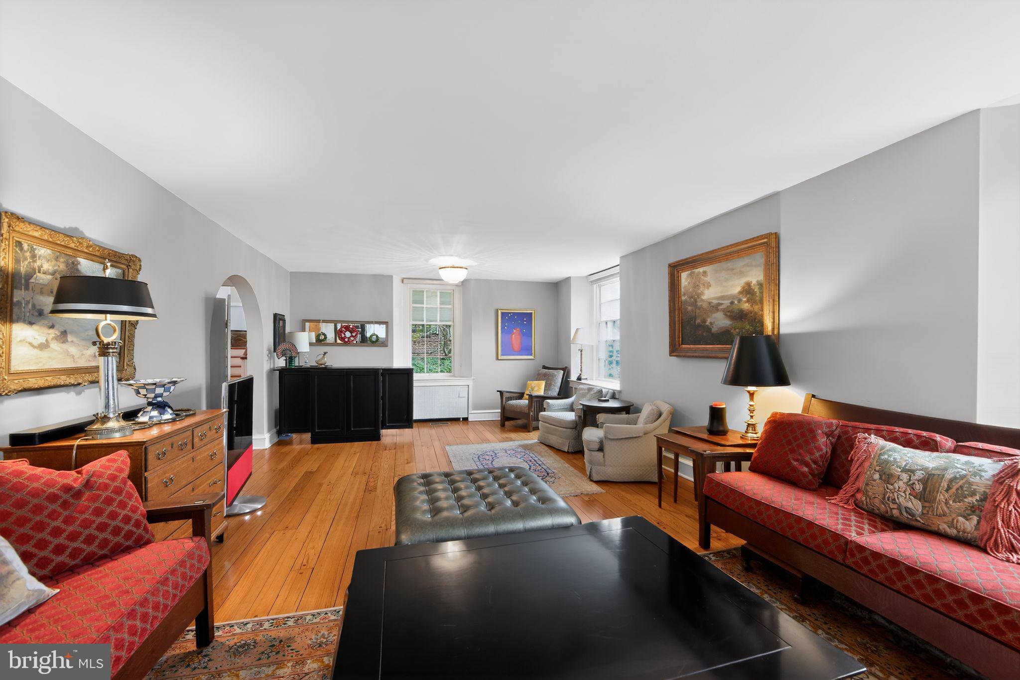 306 Windsor Avenue Wayne, PA 19087 - Photo 19 of 36 a living room with furniture and a flat screen tv
