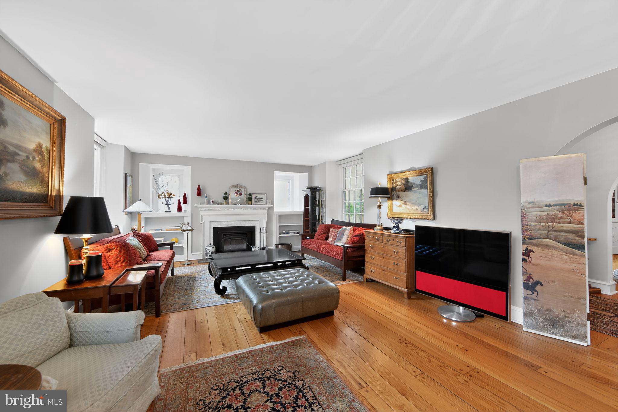 306 Windsor Avenue Wayne, PA 19087 - Photo 20 of 36 a living room with furniture and a fireplace