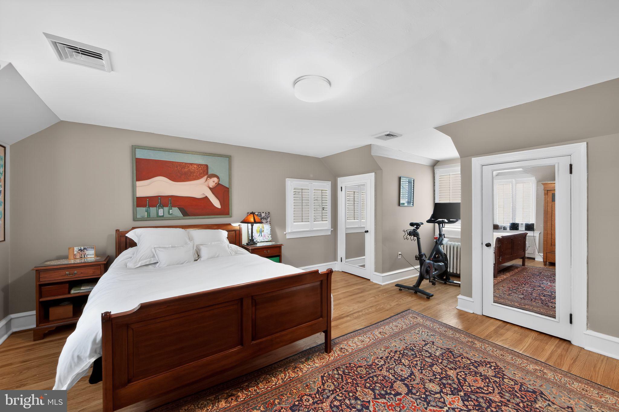 306 Windsor Avenue Wayne, PA 19087 - Photo 23 of 36 a bed room with a bed and a mirror