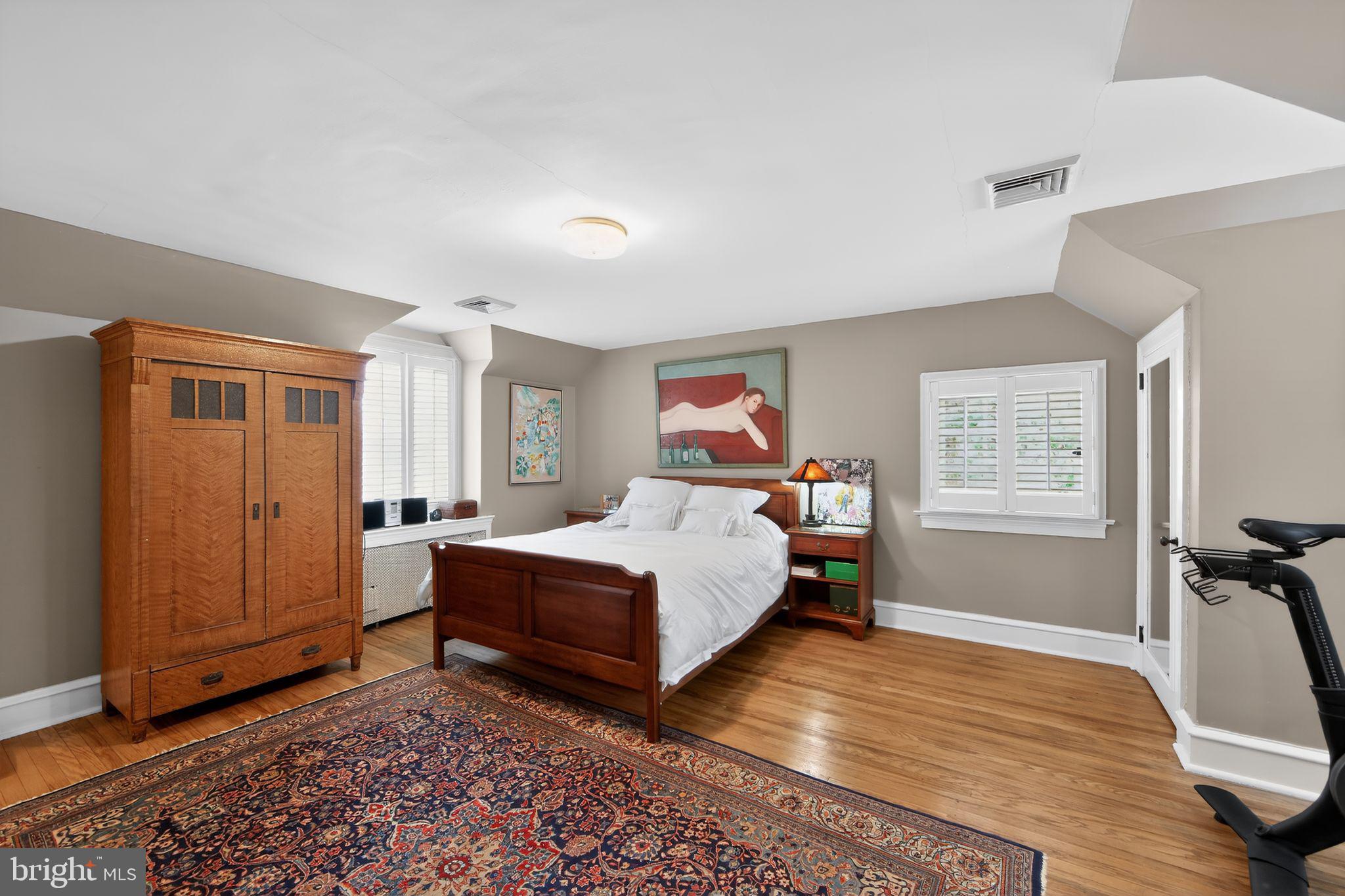306 Windsor Avenue Wayne, PA 19087 - Photo 24 of 36 a bed room with a bed and a window