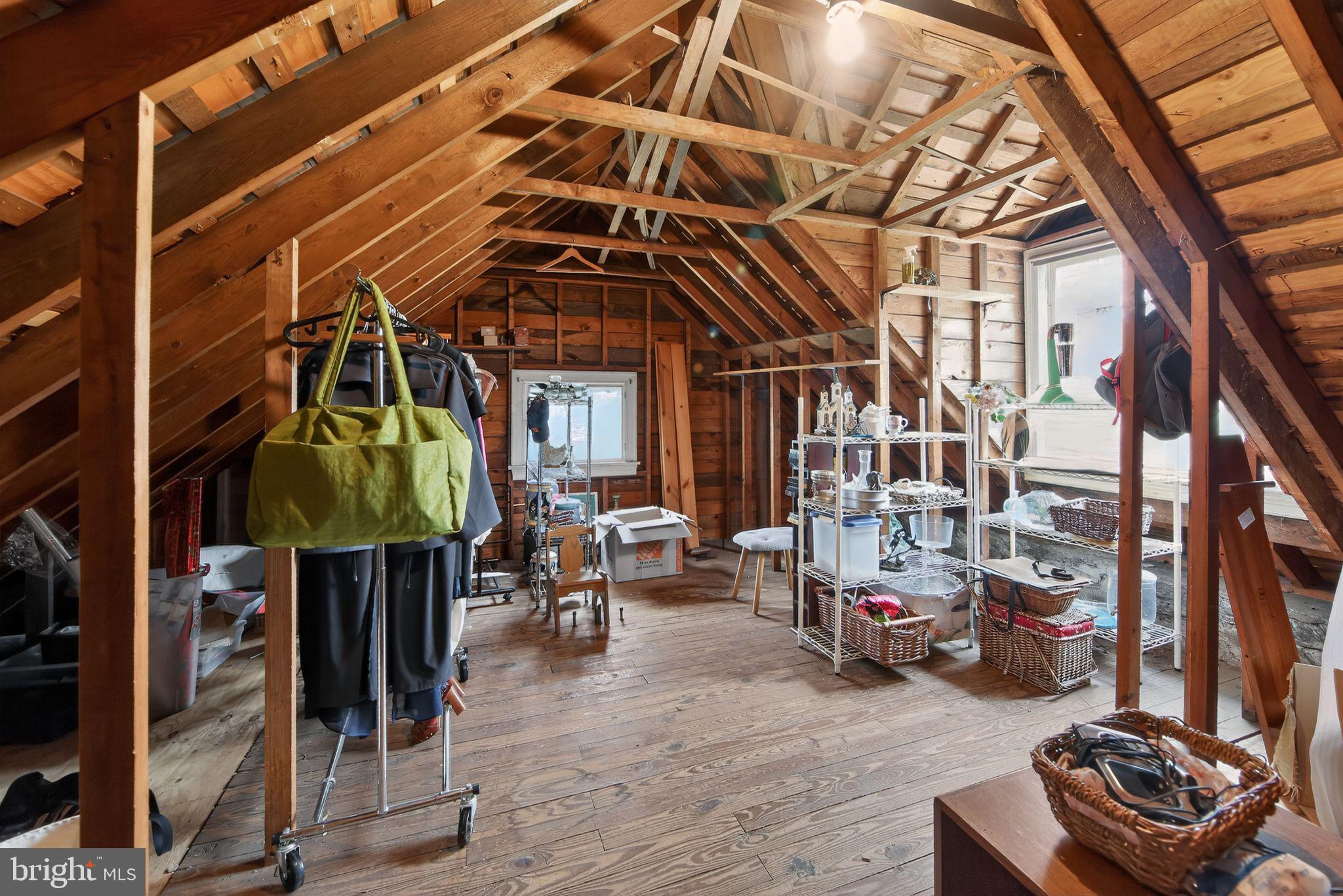 306 Windsor Avenue Wayne, PA 19087 - Photo 33 of 36 a roof deck with table and chairs and potted plants