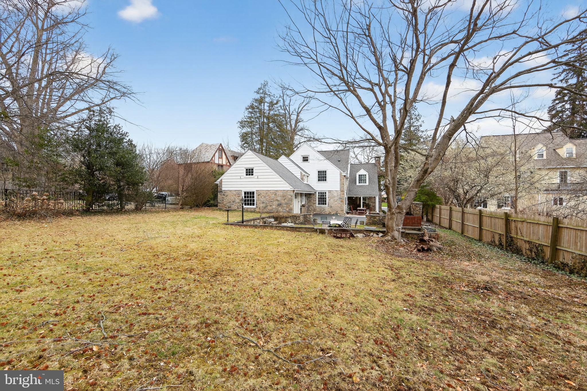 306 Windsor Avenue Wayne, PA 19087 - Photo 35 of 36 a large white house with a large tree in front of it