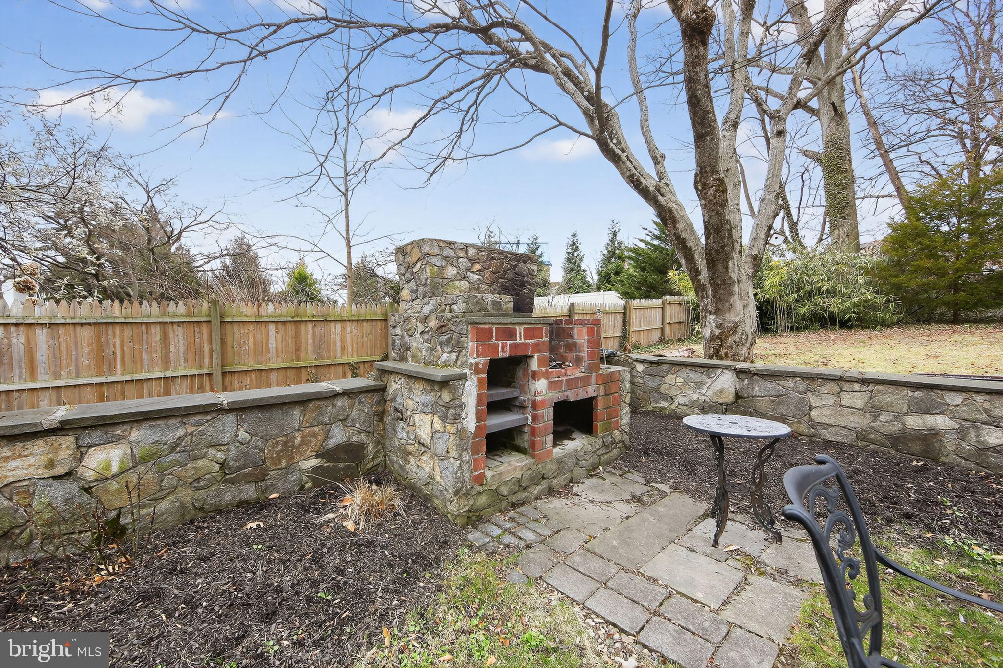 306 Windsor Avenue Wayne, PA 19087 - Photo 7 of 36 a view of a backyard with sitting area