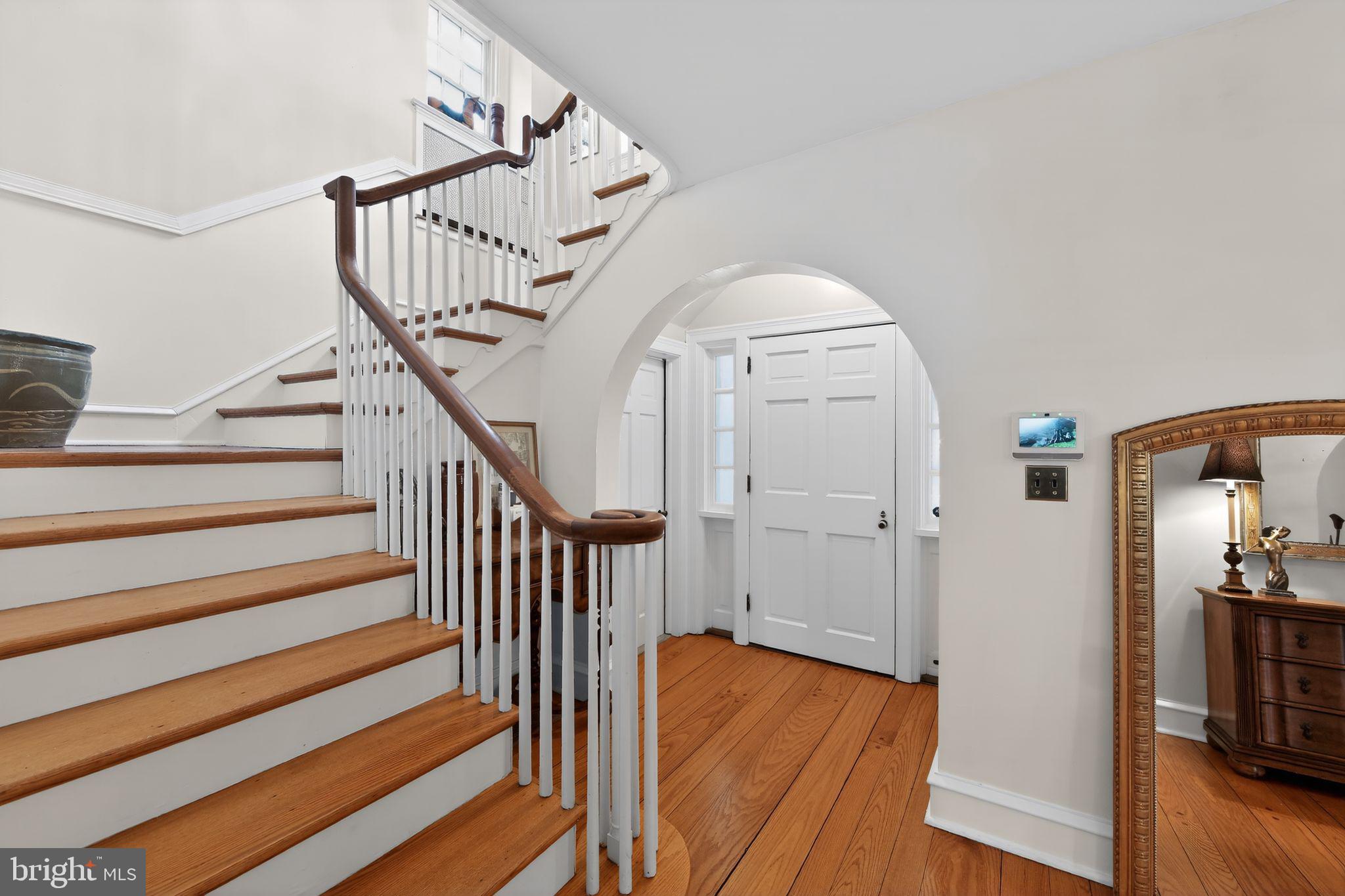 306 Windsor Avenue Wayne, PA 19087 - Photo 8 of 36 a view of entryway and hall with wooden floor