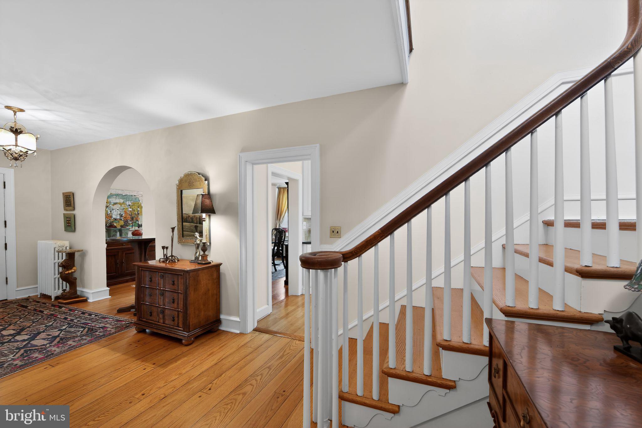 306 Windsor Avenue Wayne, PA 19087 - Photo 10 of 36 a view of an entryway with wooden floor and windows