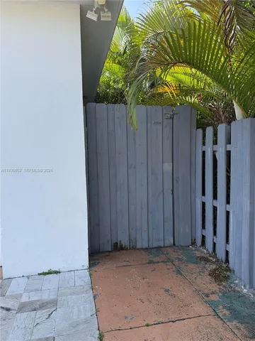 a view of entryway with wooden wall