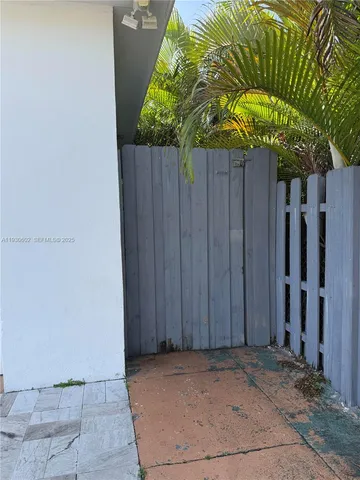 a view of entryway with wooden wall