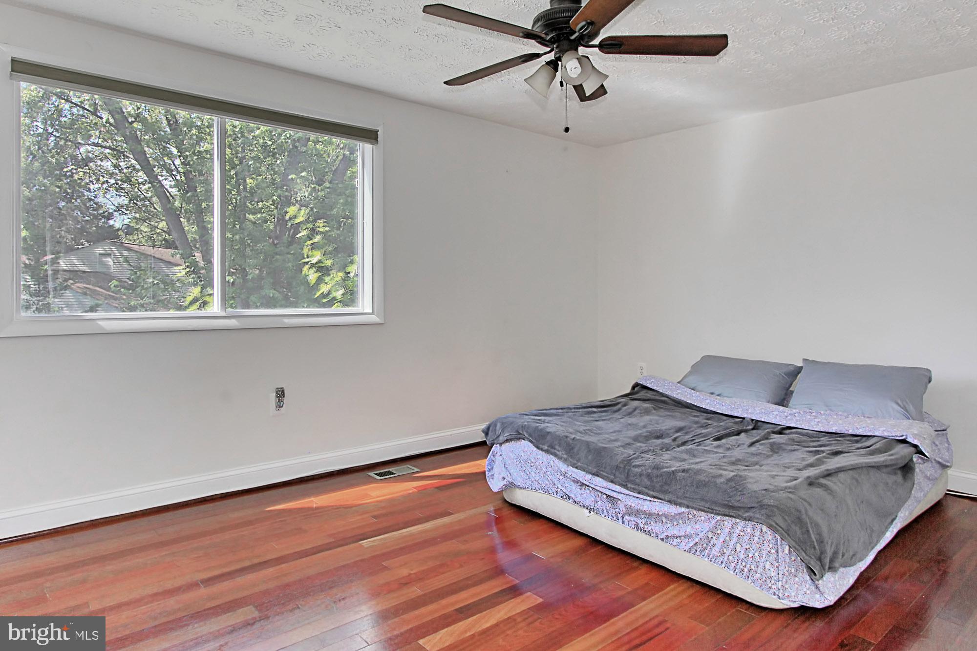 12809 Wrexham Road Herndon, VA 20171 - Photo 17 of 38 Master Bedroom with View of the Backyard
