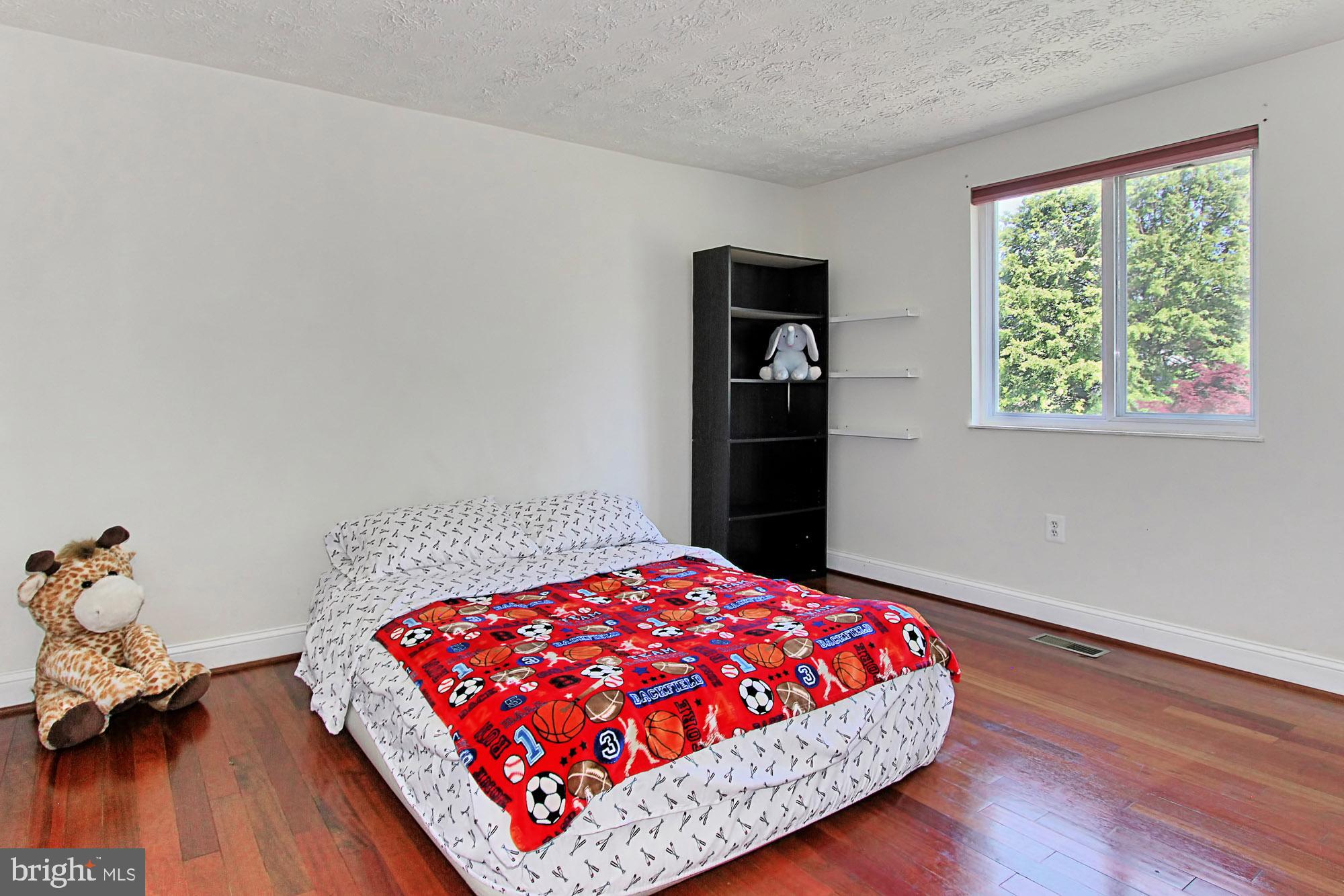 12809 Wrexham Road Herndon, VA 20171 - Photo 19 of 38 Second Bedroom includes Hardwood Floors