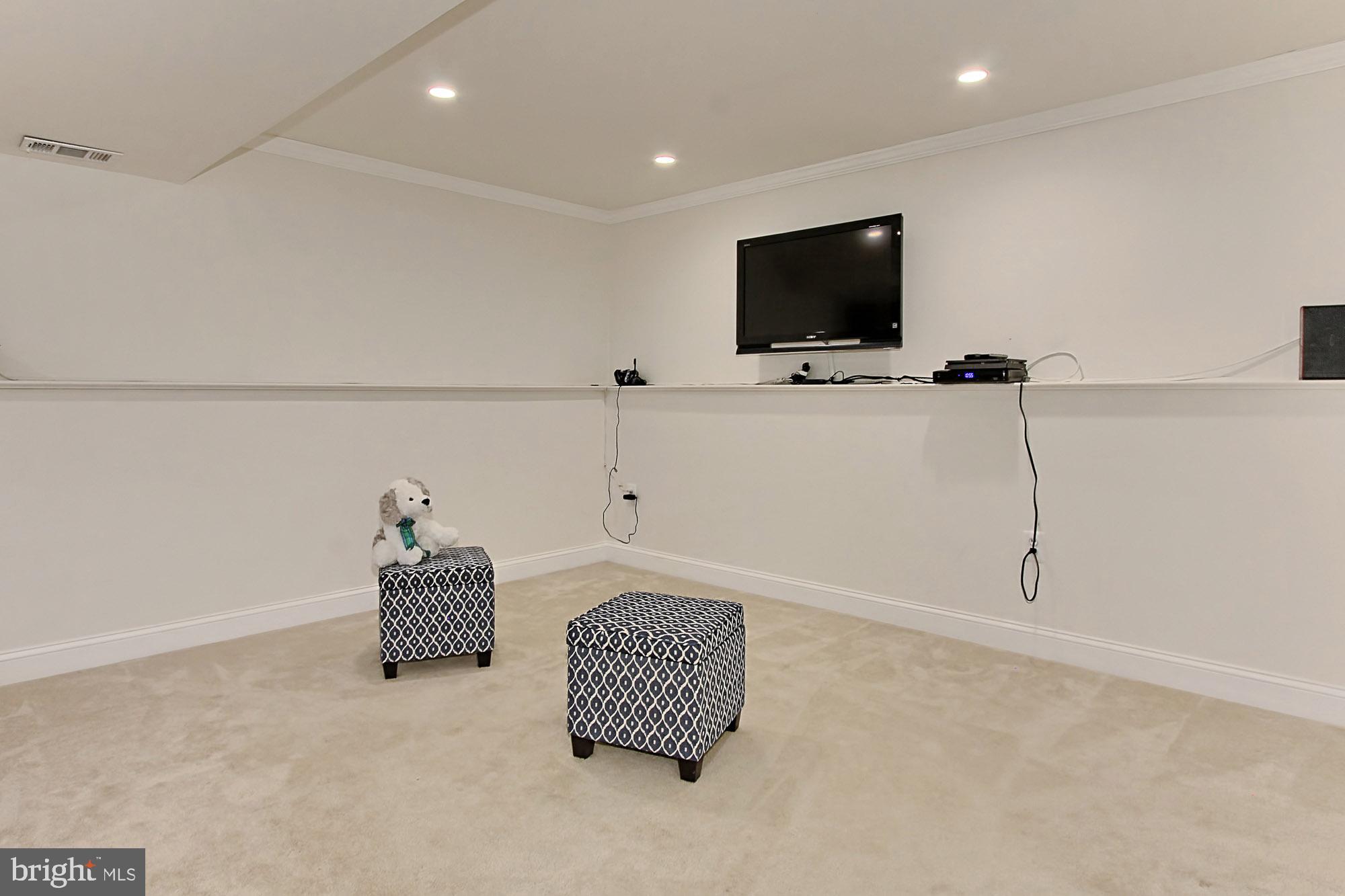 12809 Wrexham Road Herndon, VA 20171 - Photo 25 of 38 Convenient Shelf around the Family Room