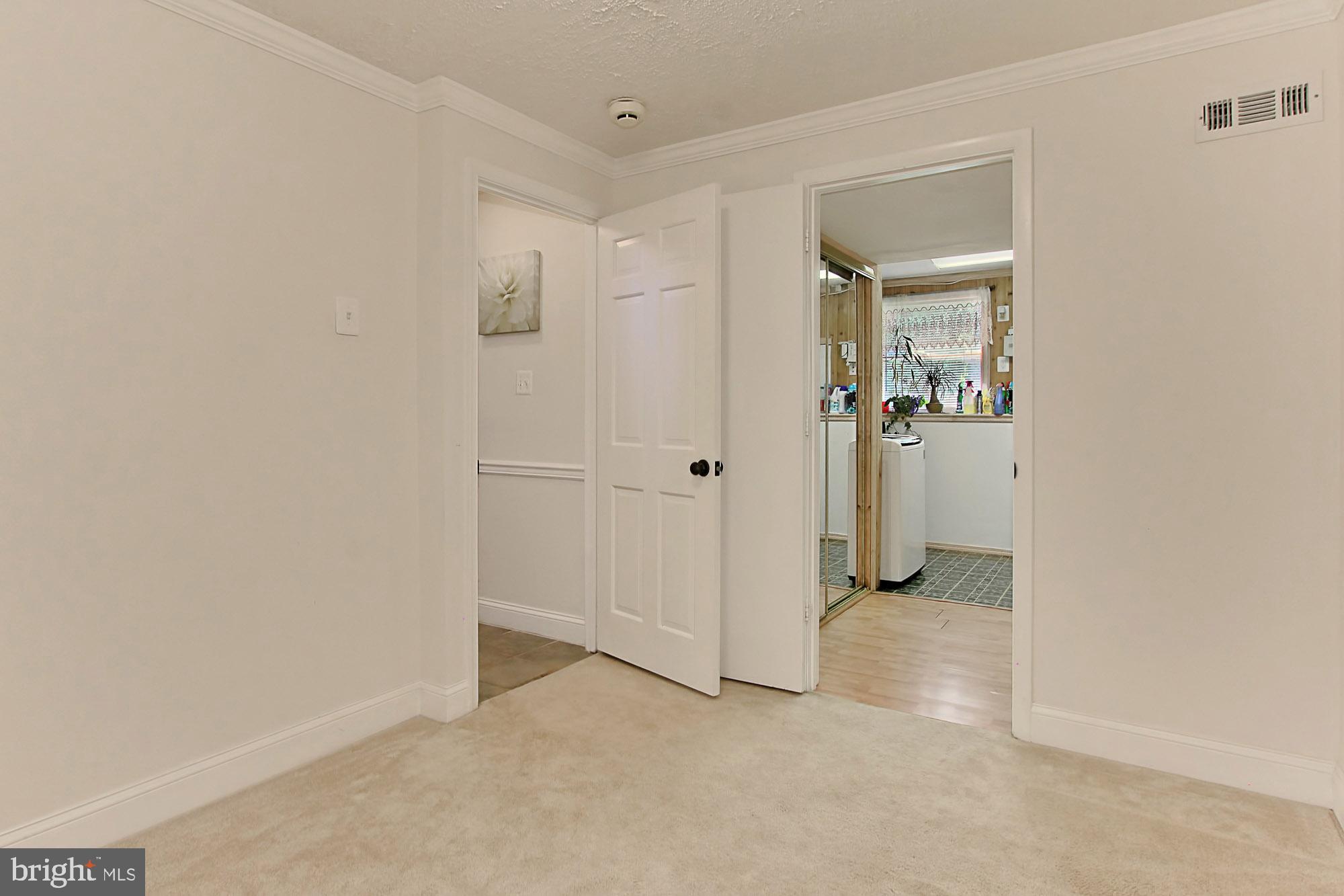 12809 Wrexham Road Herndon, VA 20171 - Photo 31 of 38 Den has Access to the Garage
