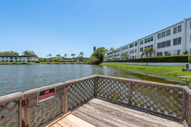 an aerial view of a house with outdoor space