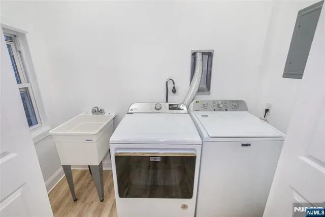 a utility room with dryer and washer