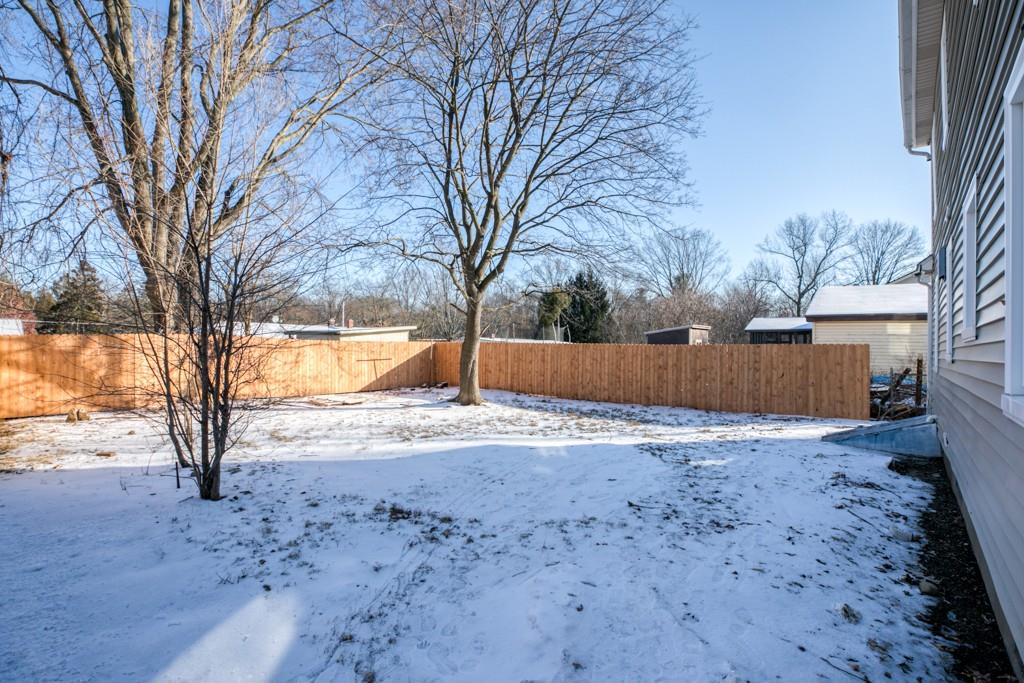173 Lucerne Road Springfield, MA 01119 - Photo 22 of 22 a view of yard covered with snow in outdoor space