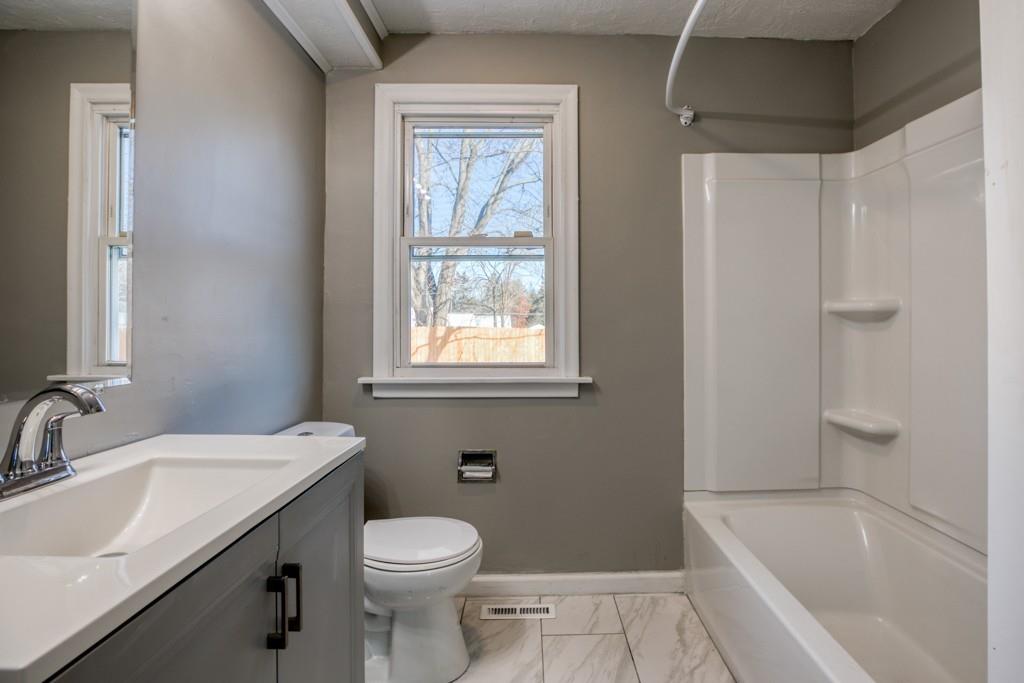 173 Lucerne Road Springfield, MA 01119 - Photo 3 of 22 a bathroom with a sink toilet and shower