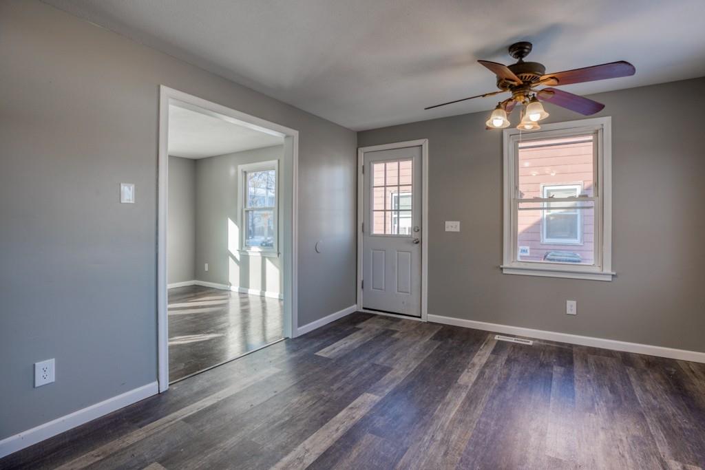 173 Lucerne Road Springfield, MA 01119 - Photo 8 of 22 wooden floor in an empty room with a window